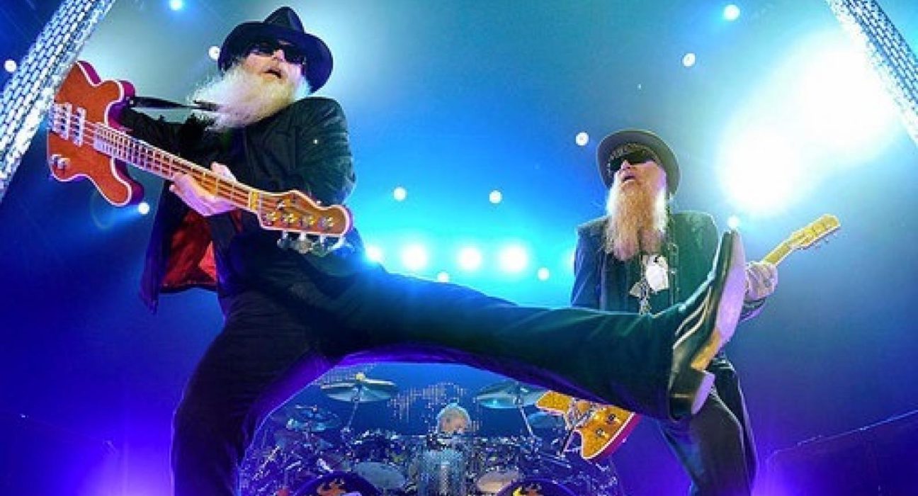 Billy Gibson and ZZ Top playing guitars onstage